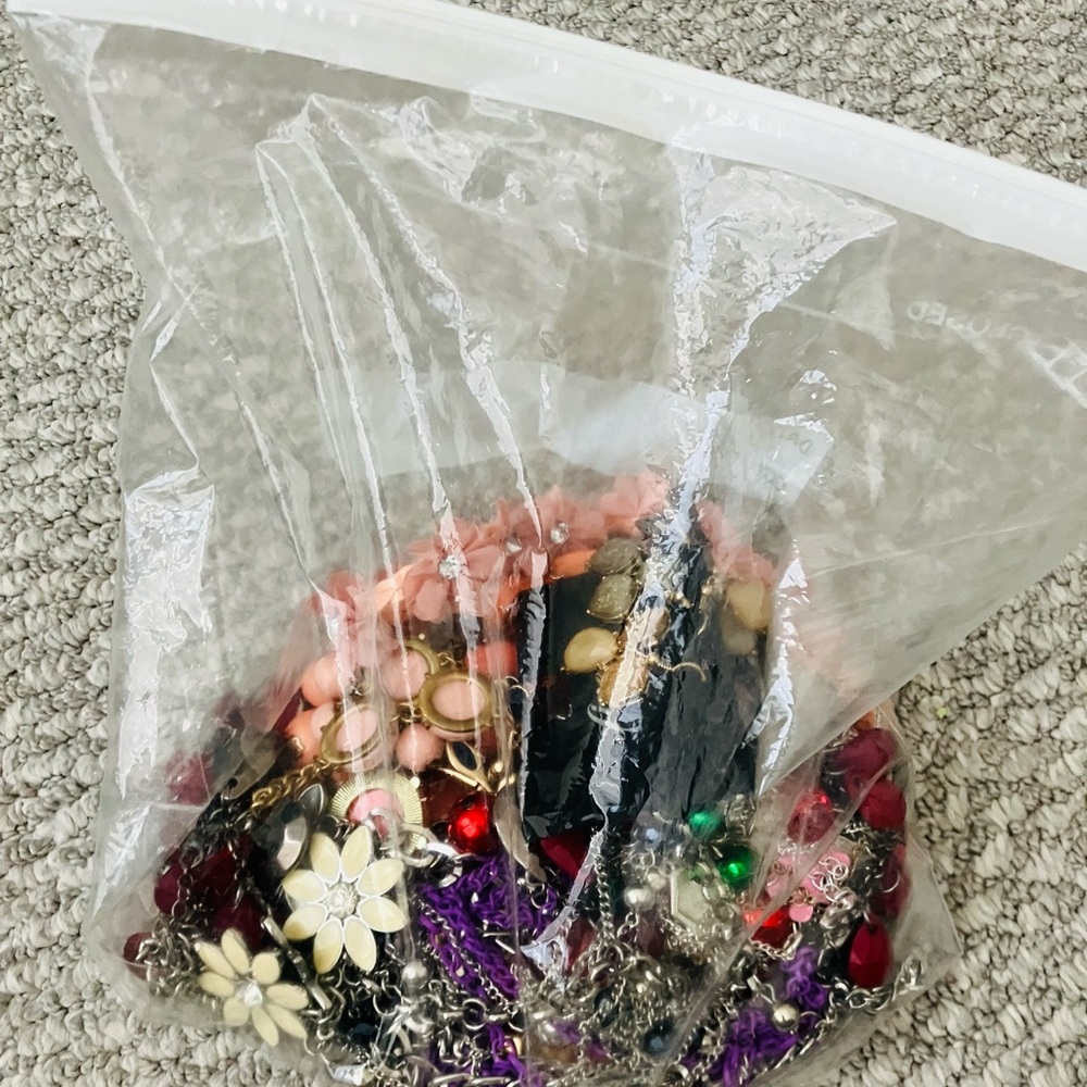 19 piece used  jewelry bag